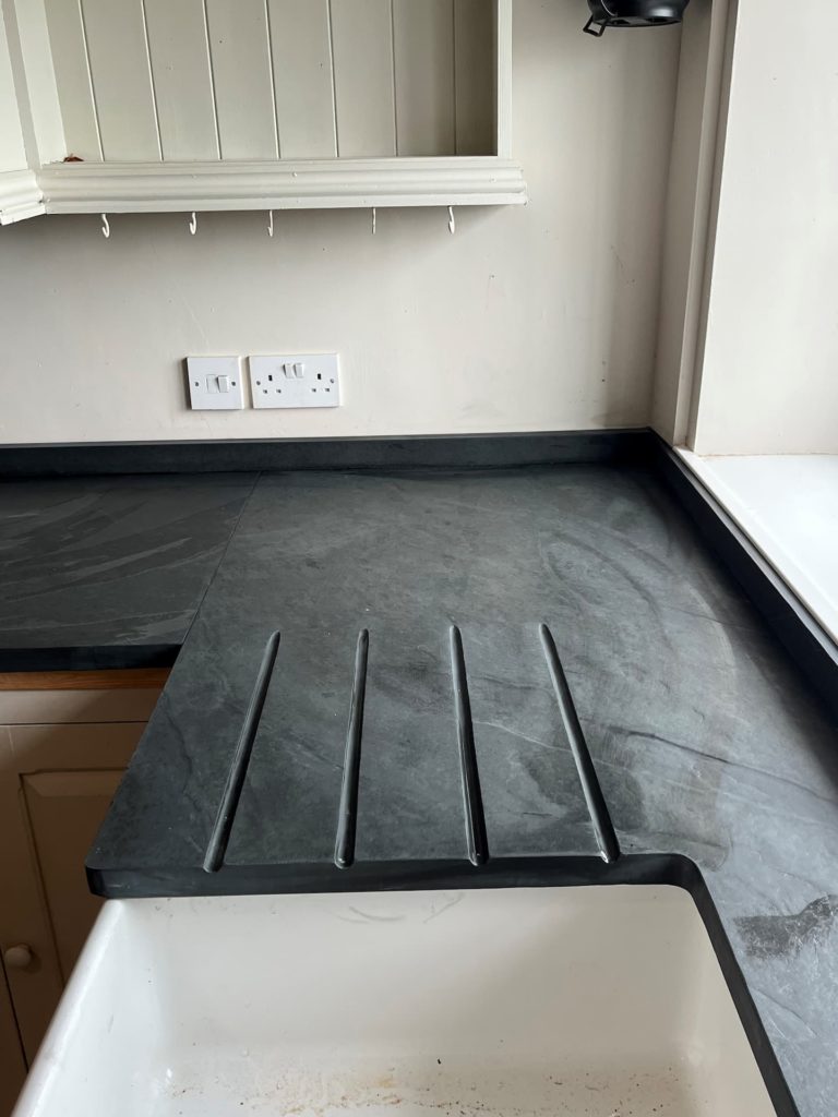 Slate countertop in stylish kitchen